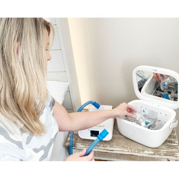 Woman cleaning CPAP Masks